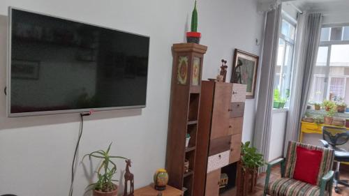 Et tv og/eller underholdning på Refúgio Aconchegante