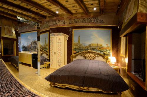 Una cama o camas en una habitación de Il MOSAICO piccola spa