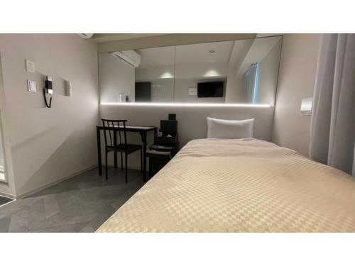 Un pat sau paturi într-o cameră la Hotel Wisteria NARA - Vacation STAY 99261v