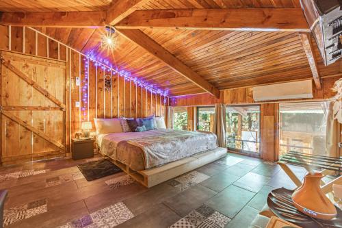 Katil atau katil-katil dalam bilik di Villas Wanderlust