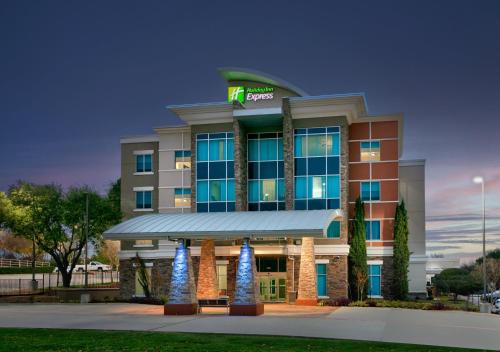 a rendering of the front of a hotel at Holiday Inn Express & Suites North Dallas at Preston by IHG in Dallas
