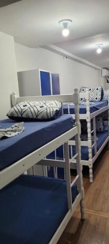 a group of bunk beds in a room at Hostel Princess Copacabana in Rio de Janeiro