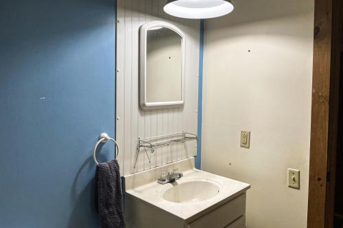 a bathroom with a sink and a mirror at Summertime III in Bar Harbor