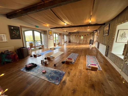 an overhead view of a living room with mats on the floor at The Old Flax Mill Yoga Retreat in Coleraine
