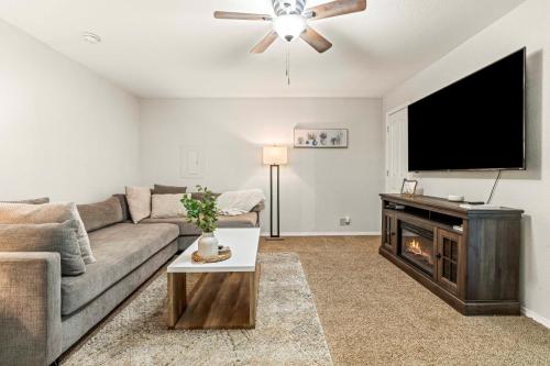 a living room with a couch and a flat screen tv at Caldwell Charming 1BedBath Home next Golf Course in Caldwell