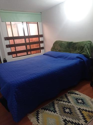 Cama o camas de una habitación en Alojamiento Aurora de Acacias