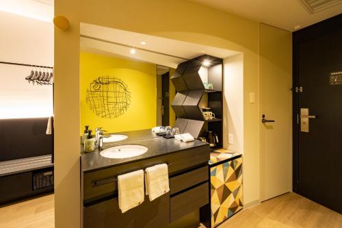 Ένα ή περισσότερα κρεβάτια σε δωμάτιο στο Osaka Excel Hotel Tokyu