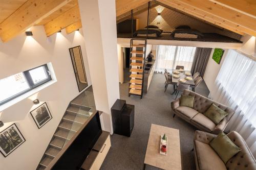 Posezení v ubytování Chalet Malino - Apartments