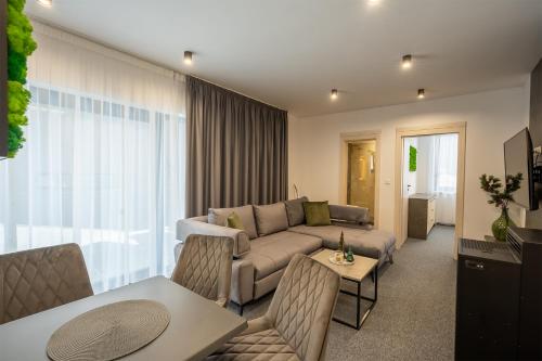 Posezení v ubytování Chalet Malino - Apartments