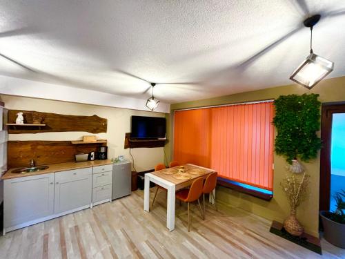Η κουζίνα ή μικρή κουζίνα στο Roots Apartment 2