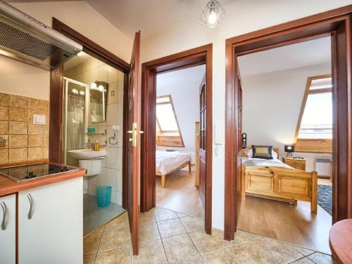 Posteľ alebo postele v izbe v ubytovaní Apart4Sleepers Apartament Dwupoziomowy Pardałówka