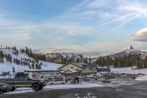 a parking lot at a ski resort in the snow at Oak Street Retreat in Sisters