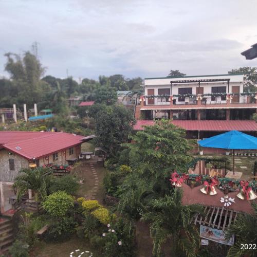 an aerial view of a resort with a building at Casa de Robles Tanay Rizal in Tanay
