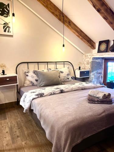 a bedroom with a large bed in a room at HealthyStudio512 Apartments in Kotor