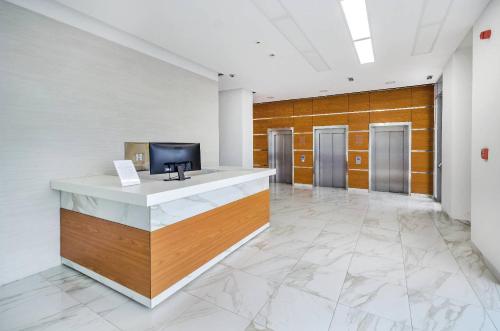 a lobby with a reception desk in a building at A BLOK1 NEW BELGRADE in Novi Beograd