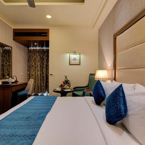 Cama o camas de una habitación en Godwin Candolim,Goa