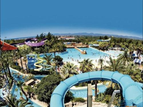 an aerial view of a water park with a water slide at APARTBEACH SALOU y PLAYA 742 in Salou