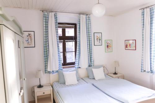 Postel nebo postele na pokoji v ubytování Dubina