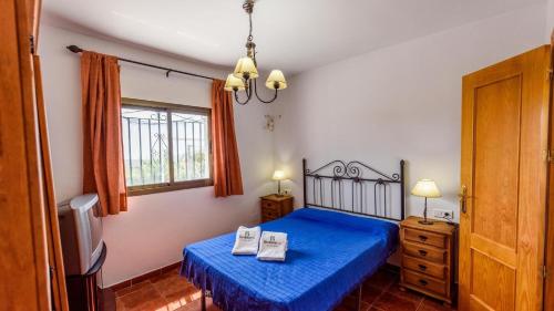Posteľ alebo postele v izbe v ubytovaní Casa Los Pérez Sedella by Ruralidays