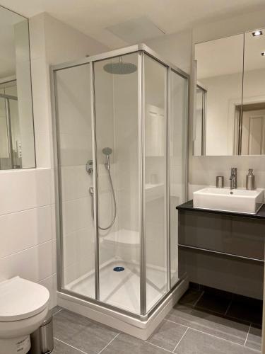 Ванная комната в Lion`s Rooms n Apartments