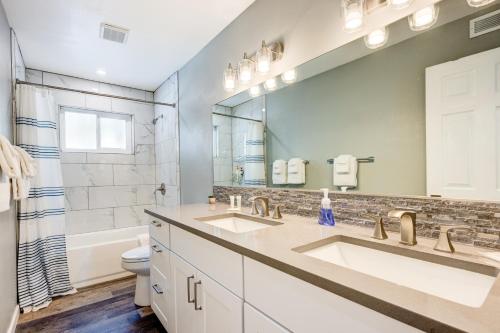 a bathroom with two sinks and a large mirror at Incline Village Getaway in Incline Village