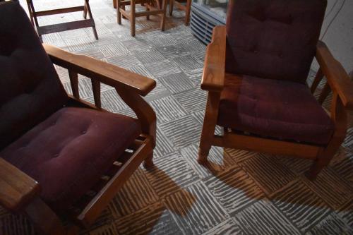 a couple of chairs sitting on top of a floor at La Enramada in Amaichá del Valle