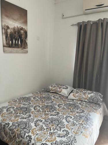 Ένα ή περισσότερα κρεβάτια σε δωμάτιο στο Mukala Lodge