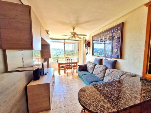 a living room with a couch and a table at Apartamento San Marcos by SanSe Holidays in Donostia-San Sebastián