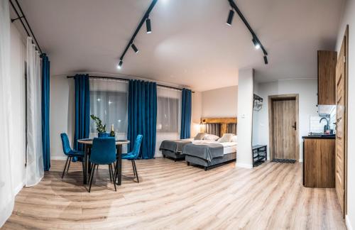 Posteľ alebo postele v izbe v ubytovaní ApartHouse Apartamenty w Białce Tatrzańskiej