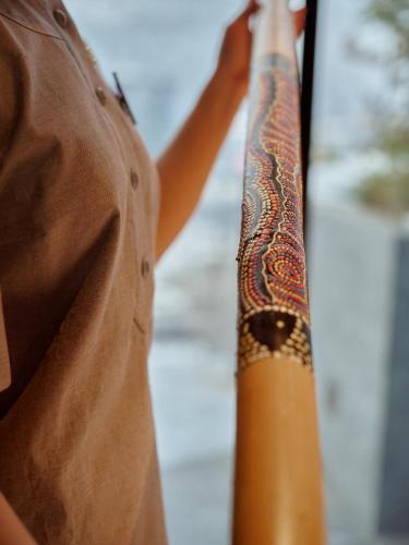 a man with a tattoo on his arm at HAY boutique hotel & SPA by Edem Family in Bukovel