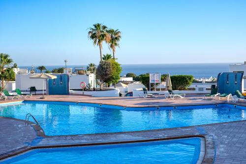 Sky and Sea Loma Verde - Pool and terrace with sea view - By Lanzarote Vacation Homes