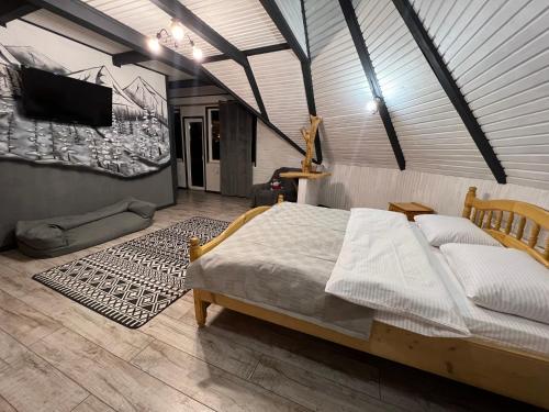 Tempat tidur dalam kamar di SoloMia
