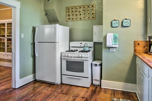 a kitchen with a white refrigerator and a stove at Bisbee Home Fantastic Views and Walkable Location! in Bisbee