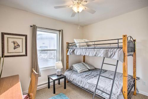 a bedroom with a bunk bed and a window at Quaint Montrose Cottage Less Than 1 Mi to Main Street in Montrose