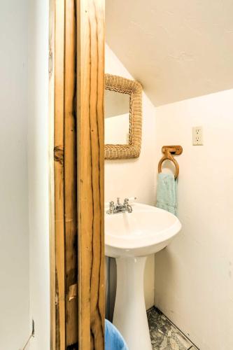 a bathroom with a sink and a mirror at Marble Hideaway Cabin with Mountain Views and Deck! in Marble