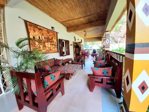 Гостиная зона в Casa Hotel Sinkiling Gambia