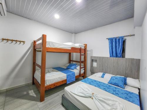 Postel nebo postele na pokoji v ubytování MIRADORES DEL PARAISO