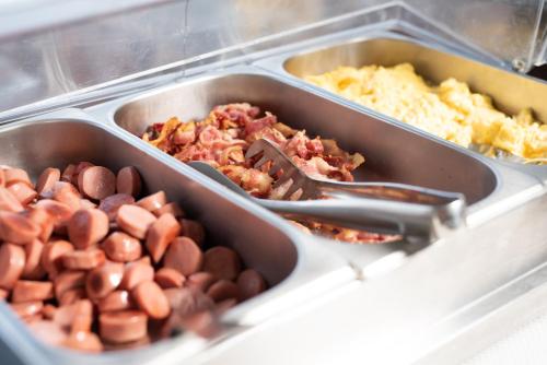 a plastic container filled with different types of food at Hotel Calabona in Alghero