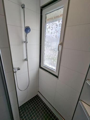 Ένα μπάνιο στο Ferienwohnung Elbaue