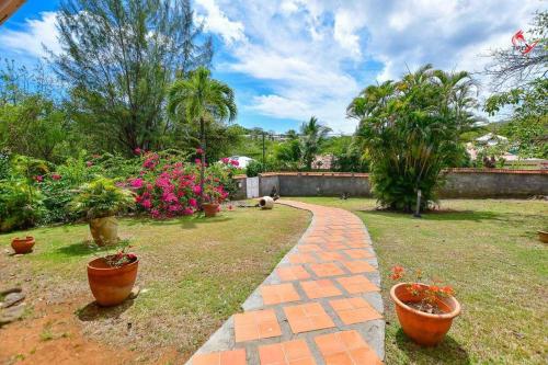 Jardín al aire libre en AGREABLE VILLA DU DIAMANT