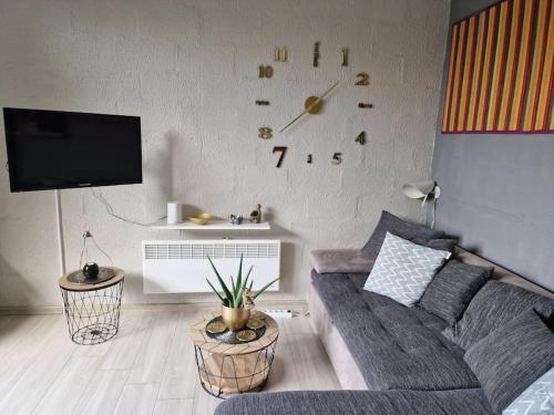 TV a/nebo společenská místnost v ubytování Zen'Ny