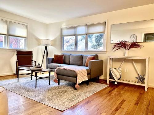 a living room with a couch and a fireplace at NEW 3 BRD Modern Urban Gateway in Arlington