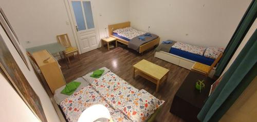 A bed or beds in a room at Appartement Belvedere Wien