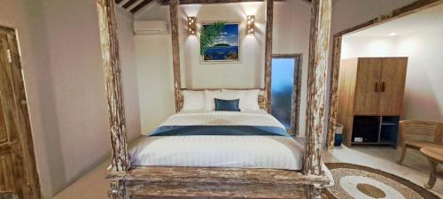 Ένα ή περισσότερα κρεβάτια σε δωμάτιο στο Oasis Villas