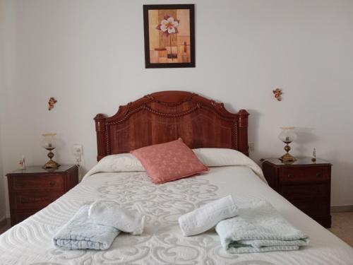 Giường trong phòng chung tại La Casa de la Abuela Jesús