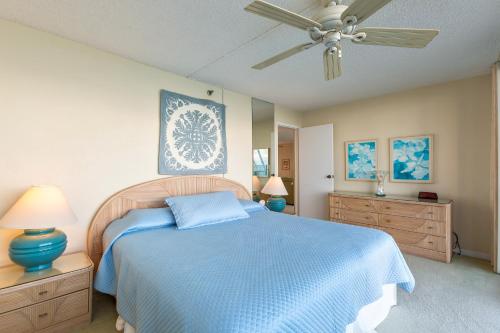 Postel nebo postele na pokoji v ubytování Valley Isle Resort 210