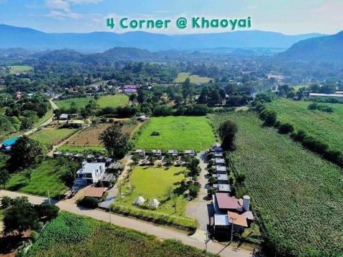 an aerial view of a park with mountains in the background at 4 Corner Khaoyai in Mu Si
