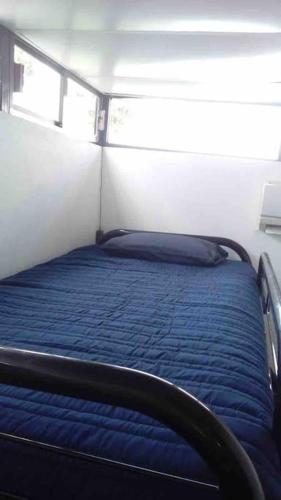 Postel nebo postele na pokoji v ubytování SUITE CLIMATIZADA Y EQUIPADA Zona Dorada Tuxtla