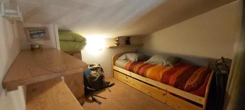 Katil atau katil-katil dalam bilik di Appartement chalet