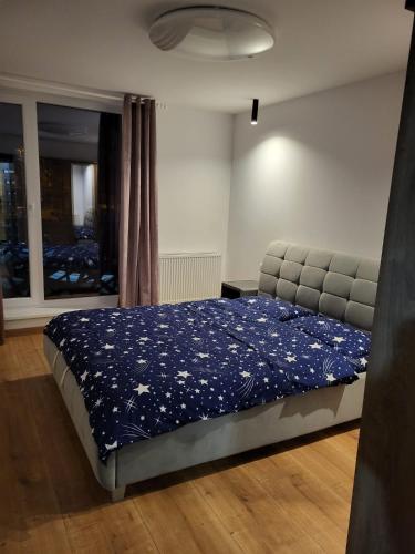 Ένα ή περισσότερα κρεβάτια σε δωμάτιο στο ApartHotel Dominic Residence